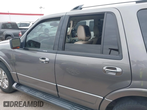 2011 Ford Expedition Limited with VIN 1FMJU1K50BEF09630, listed as a IAAI auction lot 41439602 with 192,409 mi miles. Bid and sale history available at carsss.com. Image 14.