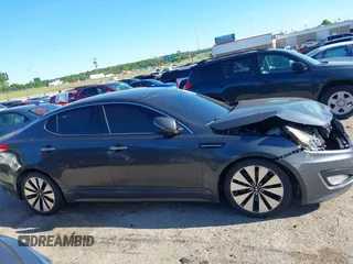 2011 Kia Optima SX z VIN KNAGR4A60B5126988, wystawiony jako IAAI lot #42313244 z przebiegiem 152 661 mil mil oraz . Historia ofert i sprzedaży dostępna na DreamBid. Obrazek 13.