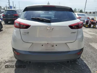 2017 Mazda CX-3 Touring z VIN JM1DKDC78H0150588, wystawiony jako Copart lot #55284205 z przebiegiem 78 923 mil mil oraz Szkoda całkowita • Salvage title. Historia ofert i sprzedaży dostępna na DreamBid. Obrazek 6.