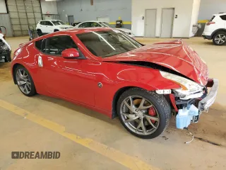 2015 Nissan 370Z Sport with VIN JN1AZ4EH1FM444251, listed as a Copart auction lot 55631915 with 104,622 mi miles and Salvage title. Bid and sale history available at DreamBid. Image 4.