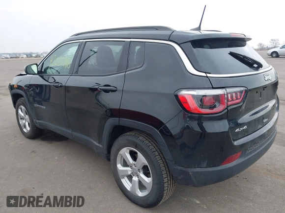 2018 Jeep Compass Altitude with VIN 3C4NJDBB9JT202297, listed as a IAAI auction lot 42020996 with 59,461 mi miles and . Bid and sale history available at DreamBid. Image 3.
