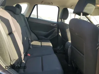 2016 Mazda CX-5 Sport with VIN JM3KE2BE7G0739544, listed as a Copart auction lot 75557244 with 128,336 mi miles and Salvage Title. Bid and sale history available at DreamBid. Image 11.