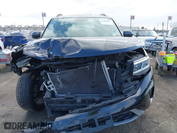 2021 Volkswagen Atlas SE z VIN 1V2WR2CAXMC558294, wystawiony jako IAAI lot #41447619 z przebiegiem 48 652 mil mil oraz . Historia ofert i sprzedaży dostępna na DreamBid. Obrazek 12.