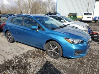 2019 Subaru Impreza Premium with VIN 4S3GTAC63K3702603, listed as a Copart auction lot 48428615 with 79,004 mi miles and Salvage Title. Bid and sale history available at DreamBid. Image 4.