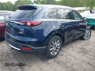 2021 Mazda CX-9 Carbon Edition with VIN JM3TCADY1M0516505, listed as a IAAI auction lot 42016644 with 50,900 mi miles and . Bid and sale history available at carsss.com. Image 4.