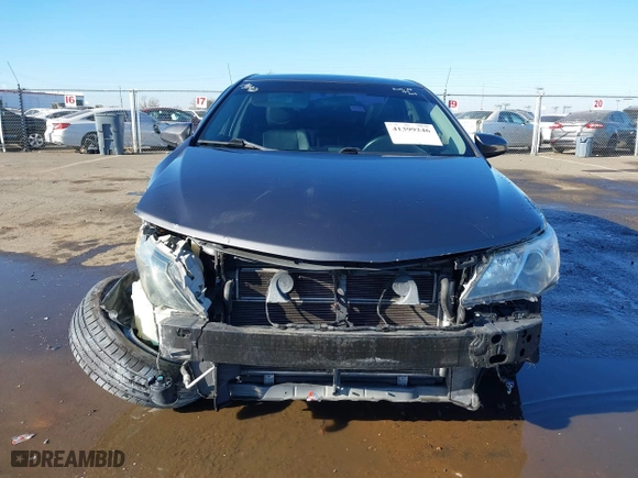 2014 Toyota Camry Hybrid LE with VIN 4T1BD1FK8EU135234, listed as a IAAI auction lot 41399246 with 104,964 mi miles. Bid and sale history available at carsss.com. Image 13.
