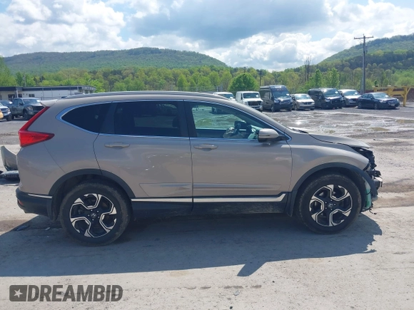 2017 Honda CR-V Touring with VIN 5J6RW2H91HL013526, listed as a IAAI auction lot 42181848 with 108,126 mi miles and . Bid and sale history available at carsss.com. Image 14.