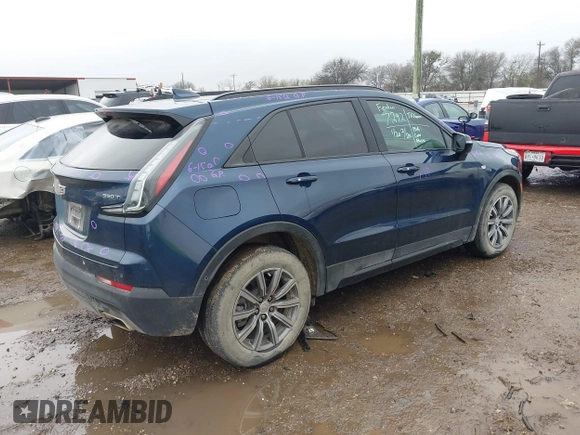 2022 Cadillac XT4 FWD Sport with VIN 1GYFZER44NF151862, listed as a IAAI auction lot 41429850 with 9,854 mi miles. Bid and sale history available at carsss.com. Image 4.