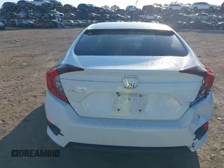2017 Honda Civic LX with VIN 19XFC2F56HE004511, listed as a IAAI auction lot 42562420 with 59,975 mi miles and . Bid and sale history available at DreamBid. Image 16.