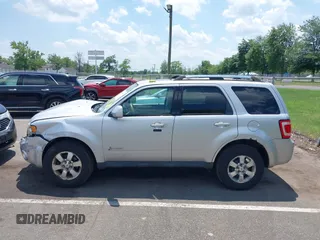 2011 Ford Escape Hybrid with VIN 1FMCU5K39BKB43196, listed as a IAAI auction lot 42558830 with 132,795 mi miles and . Bid and sale history available at DreamBid. Image 14.