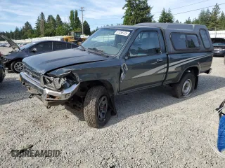 1993 Toyota Pickup DX z VIN JT4RN01P3P7060439, wystawiony jako Copart lot #57356125 z przebiegiem 259 773 mil mil oraz Szkoda całkowita • Salvage title. Historia ofert i sprzedaży dostępna na DreamBid. Obrazek 1.