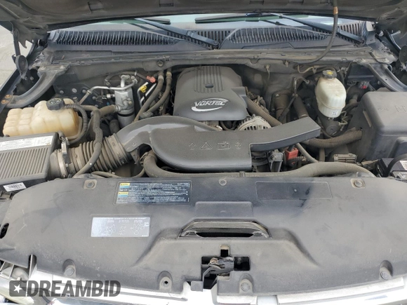 2005 Chevrolet Tahoe Z71 with VIN 1GNEC13T85R141076, listed as a Copart auction lot 54733415 with 310,992 mi miles and Salvage title. Bid and sale history available at DreamBid. Image 12.
