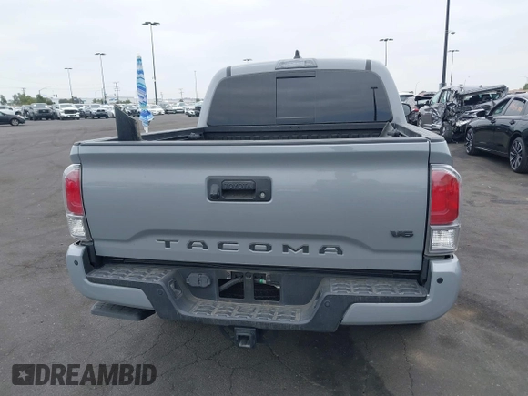 2021 Toyota Tacoma SR with VIN 3TMCZ5AN2MM405869, listed as a IAAI auction lot 42094533 with 78,449 mi miles and . Bid and sale history available at DreamBid. Image 17.