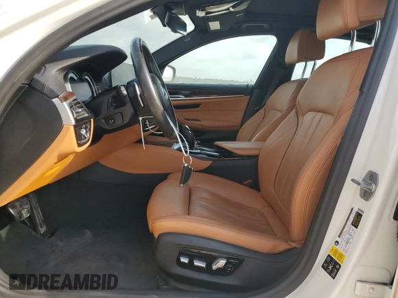 2018 BMW 5 Series M550i xDrive with VIN WBAJB9C58JG464461, listed as a Copart auction lot 53626575 with 62,436 mi miles and Salvage Title. Bid and sale history available at carsss.com. Image 7.
