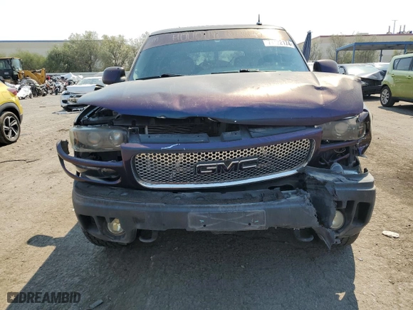 2002 GMC Yukon Denali with VIN 1GKEK63U62J340241, listed as a Copart auction lot 71122174 with 259,297 mi miles and Salvage Title. Bid and sale history available at carsss.com. Image 5.