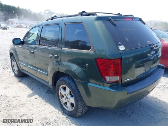 2007 Jeep Grand Cherokee Laredo with VIN 1J8GS48K67C512160, listed as a IAAI auction lot 41892105 with 204,308 mi miles. Bid and sale history available at carsss.com. Image 3.