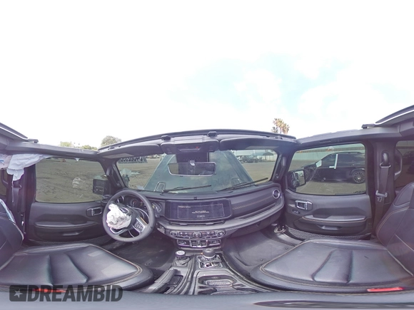 2024 Jeep Wrangler Sahara with VIN 1C4RJXP60RW116607, listed as a Copart auction lot 54562695 with 62,352 mi miles and Salvage title. Bid and sale history available at DreamBid. Image 16.