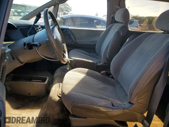 1995 Toyota Previa z VIN JT3AC14R4S1195774, wystawiony jako Copart lot #85697274 z przebiegiem 251 955 mil mil oraz Szkody całkowita. Historia ofert i sprzedaży dostępna na DreamBid. Obrazek 7.