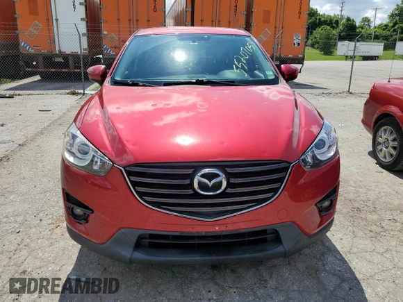 2016 Mazda CX-5 Touring with VIN JM3KE2CY0G0627886, listed as a Copart auction lot 55207054 with 95,884 mi miles and Salvage Title. Bid and sale history available at carsss.com. Image 5.