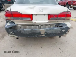 2001 Honda Accord EX z VIN 1HGCG165X1A077702, wystawiony jako IAAI lot #41770556 z przebiegiem 149 516 mil mil oraz . Historia ofert i sprzedaży dostępna na DreamBid. Obrazek 6.