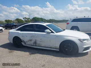2016 Audi A6 3.0T Premium Plus with VIN WAUFGAFC9GN003664, listed as a IAAI auction lot 41890962 with 100,485 mi miles. Bid and sale history available at carsss.com. Image 13.