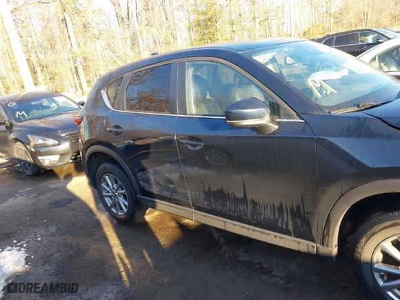 2022 Mazda CX-5 2.5 S Carbon Edition with VIN JM3KFBCM4N0566968, listed as a IAAI auction lot 41312448 with NaN miles. Bid and sale history available at carsss.com. Image 13.