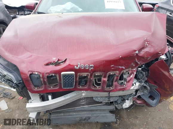 2019 Jeep Cherokee Latitude Plus with VIN 1C4PJLLB9KD434990, listed as a IAAI auction lot 41959477 with 96,283 mi miles and . Bid and sale history available at DreamBid. Image 6.