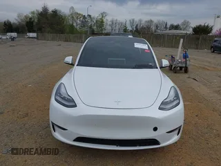 2021 Tesla Model Y Long Range with VIN 5YJYGDEE6MF122363, listed as a IAAI auction lot 41952018 with 54,263 mi miles and . Bid and sale history available at carsss.com. Image 12.
