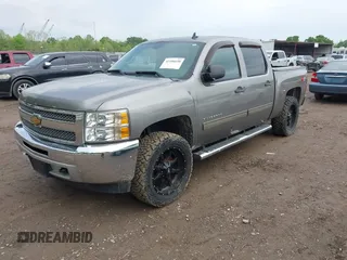 2013 Chevrolet Silverado 1500 LT with VIN 3GCPKSE78DG246175, listed as a IAAI auction lot 42106648 with 161,940 mi miles. Bid and sale history available at carsss.com. Image 2.