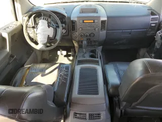 2004 Nissan Titan LE with VIN 1N6AA07B24N575053, listed as a Copart auction lot 50370985 with 230,225 mi miles and Salvage title. Bid and sale history available at DreamBid. Image 8.