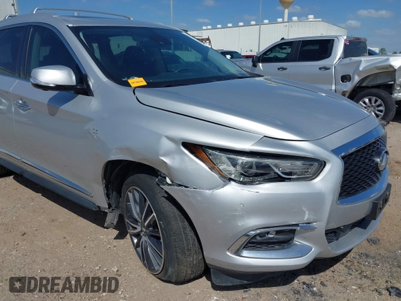 2019 Infiniti QX60 LUXE with VIN 5N1DL0MN8KC526839, listed as a IAAI auction lot 41811271 with 83,729 mi miles. Bid and sale history available at carsss.com. Image 6.