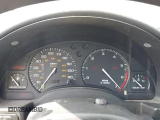 1999 Saturn SL z VIN 1G8ZH5280XZ249494, wystawiony jako IAAI lot #42347493 z przebiegiem 106 491 mil mil oraz . Historia ofert i sprzedaży dostępna na DreamBid. Obrazek 7.