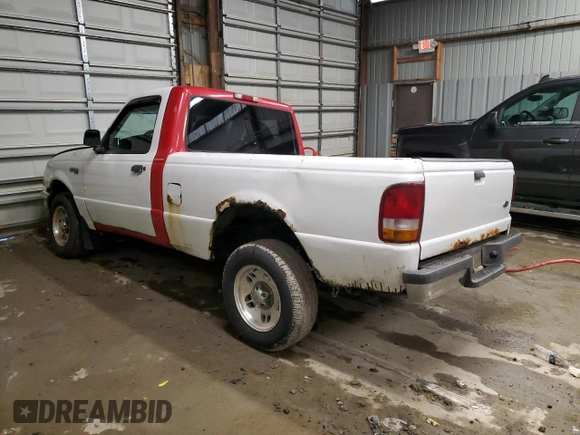 1999 Ford Ranger XL with VIN 1FTYR10C7XPB67854, listed as a Copart auction lot 86255294 with 169,102 mi miles and Salvage title. Bid and sale history available at DreamBid. Image 2.