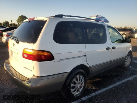 2000 Toyota Sienna LE with VIN 4T3ZF13CXYU184839, listed as a Copart auction lot 80035434 with 0 mi miles and Salvage Title. Bid and sale history available at carsss.com. Image 3.