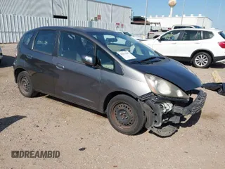 2013 Honda Fit with VIN JHMGE8H37DC048529, listed as a IAAI auction lot 42011202 with 255,113 mi miles. Bid and sale history available at carsss.com. Image 1.