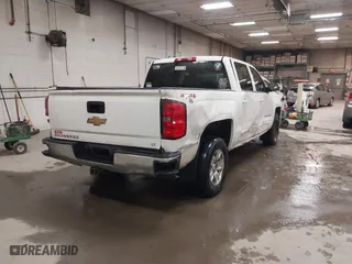2015 Chevrolet Silverado 1500 LT with VIN 3GCUKREC6FG418151, listed as a IAAI auction lot 41578889 with 115,950 mi miles. Bid and sale history available at carsss.com. Image 4.