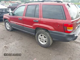 2004 Jeep Grand Cherokee Laredo with VIN 1J4GW48S64C371253, listed as a IAAI auction lot 42099607 with 260,618 mi miles. Bid and sale history available at carsss.com. Image 3.