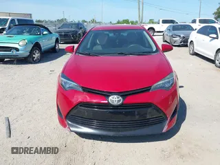 2018 Toyota Corolla L z VIN 2T1BURHE1JC011808, wystawiony jako IAAI lot #42289116 z przebiegiem 124 379 mil mil oraz . Historia ofert i sprzedaży dostępna na DreamBid. Obrazek 12.