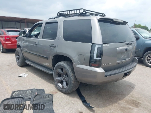 2007 Chevrolet Tahoe LS with VIN 1GNFC13C57R279441, listed as a IAAI auction lot 42428981 with 229,827 mi miles and . Bid and sale history available at DreamBid. Image 3.