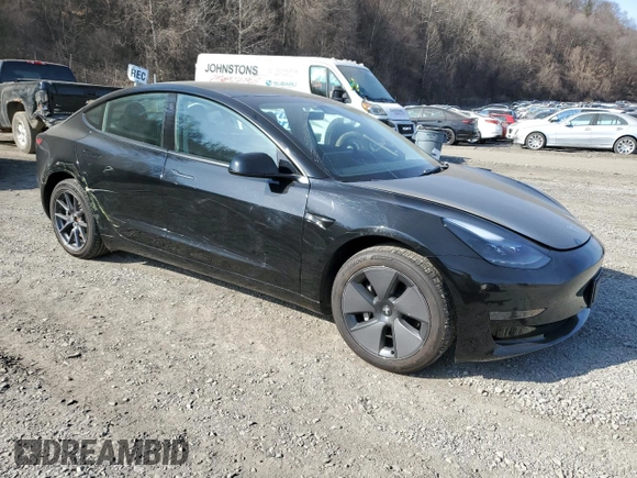 2023 Tesla Model 3 with VIN 5YJ3E1EA3PF670787, listed as a Copart auction lot 49070865 with 13,489 mi miles and Salvage title. Bid and sale history available at DreamBid. Image 4.