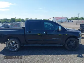 2005 Nissan Titan LE with VIN 1N6AA07B05N509859, listed as a IAAI auction lot 42662424 with 252,000 mi miles and . Bid and sale history available at DreamBid. Image 14.
