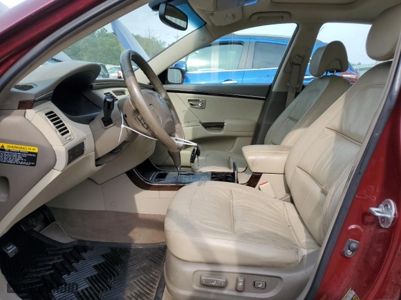 2009 Hyundai Azera GLS with VIN KMHFC46D19A358682, listed as a Copart auction lot 65164534 with 168,592 mi miles and Salvage Title. Bid and sale history available at carsss.com. Image 7.