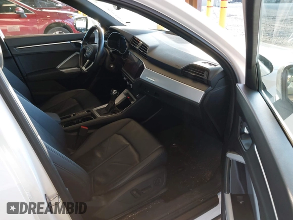 2021 Audi Q3 Premium with VIN WA1AUCF37M1087692, listed as a IAAI auction lot 41277380 with 66,039 mi miles and . Bid and sale history available at DreamBid. Image 5.