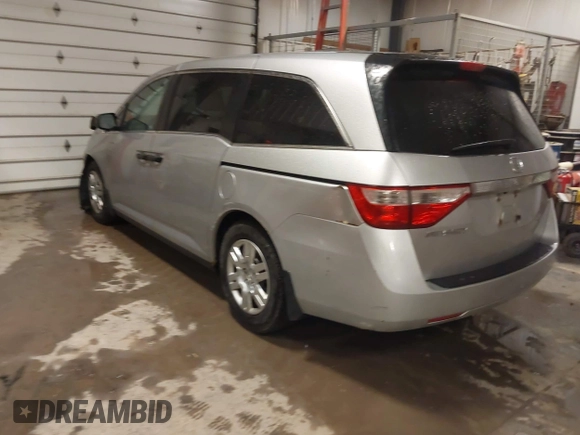 2012 Honda Odyssey LX with VIN 5FNRL5H27CB092988, listed as a IAAI auction lot 41933507 with 123,233 mi miles and . Bid and sale history available at DreamBid. Image 3.