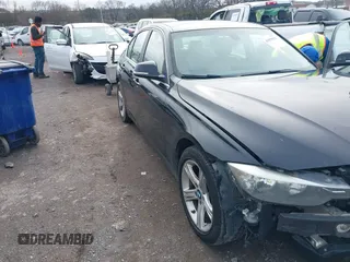 2015 BMW 3 Series 328i with VIN WBA3A5C59FF606446, listed as a IAAI auction lot 41059621 with 109,503 mi miles. Bid and sale history available at carsss.com. Image 1.