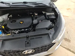 2019 Hyundai Tucson SE z VIN KM8J2CA40KU854110, wystawiony jako Copart lot #84392515 z przebiegiem 119 653 mil mil oraz Czysty tytuł • Clean title. Historia ofert i sprzedaży dostępna na DreamBid. Obrazek 14.