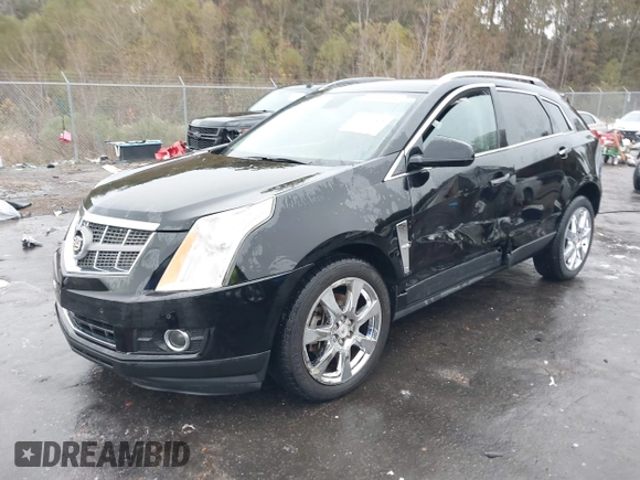 2011 Cadillac SRX Performance Collection with VIN 3GYFNBEYXBS597881, listed as a IAAI auction lot 41016643 with 164,781 mi miles and . Bid and sale history available at carsss.com. Image 17.