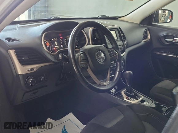 2016 Jeep Cherokee Sport z VIN 1C4PJLAB2GW354879, wystawiony jako IAAI lot #42714225 z przebiegiem 119 464 mil mil oraz . Historia ofert i sprzedaży dostępna na DreamBid. Obrazek 7.