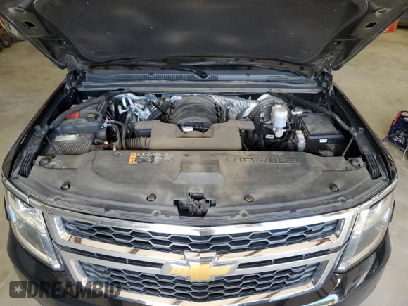 2018 Chevrolet Suburban LS z VIN 1GNSCGEC3JR140303, wystawiony jako Copart lot #69944234 z przebiegiem 48 541 mil mil oraz Szkoda całkowita • Salvage title. Historia ofert i sprzedaży dostępna na DreamBid. Obrazek 12.