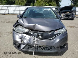 2015 Honda Fit EX-L with VIN 3HGGK5H80FM767970, listed as a Copart auction lot 55866075 with 64,435 mi miles and Salvage Title. Bid and sale history available at DreamBid. Image 5.